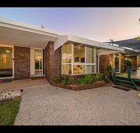 Woorim Secluded Palms Cottage - Surfers Paradise Gold Coast